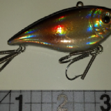A close up of the side of a fishing lure.
