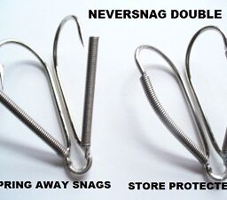 A pair of fishing hooks with different types of fishing hook.