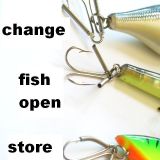 Three different types of fishing lures hanging on a hook.