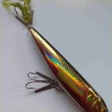 A fishing lure with two hooks on the side.