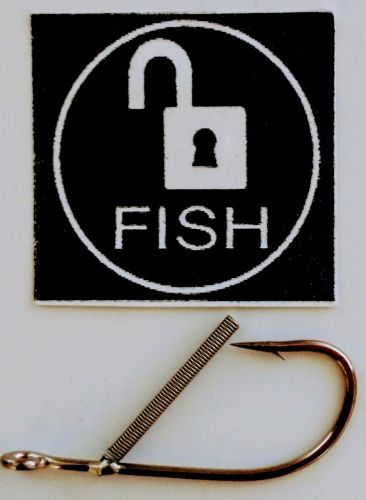 A fish hook and a sign with the word " fish " written on it.