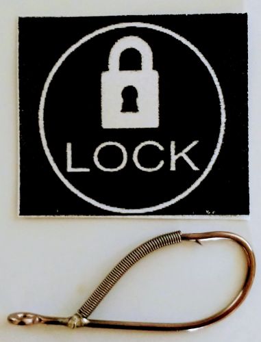 A black and white picture of a lock sign